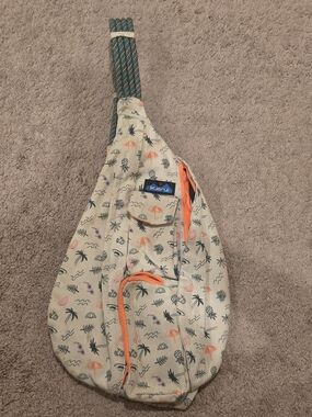 KAVU Sling Bag in Cream Beach Print